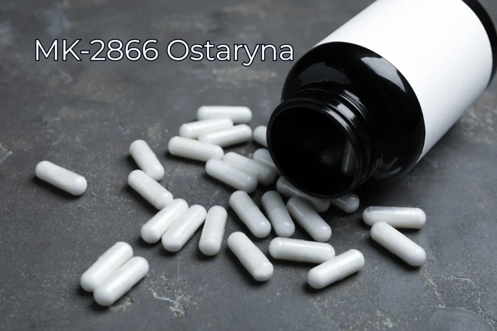 opakowanie od sarm mk-2866 z rozsypanymi kapsułkami koloru białego, typowe dla ostaryny